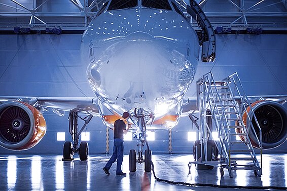 Airplane in a production hall.