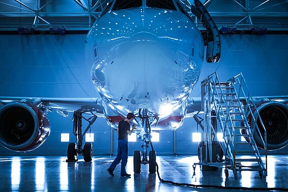 Airplane in a production hall.